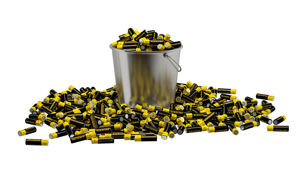 Baterías en un cubo - una gran cantidad de pilas alcalinas AA en un cubo de estaño - aislado en blanco - 3D Rendering
 - Foto, imagen