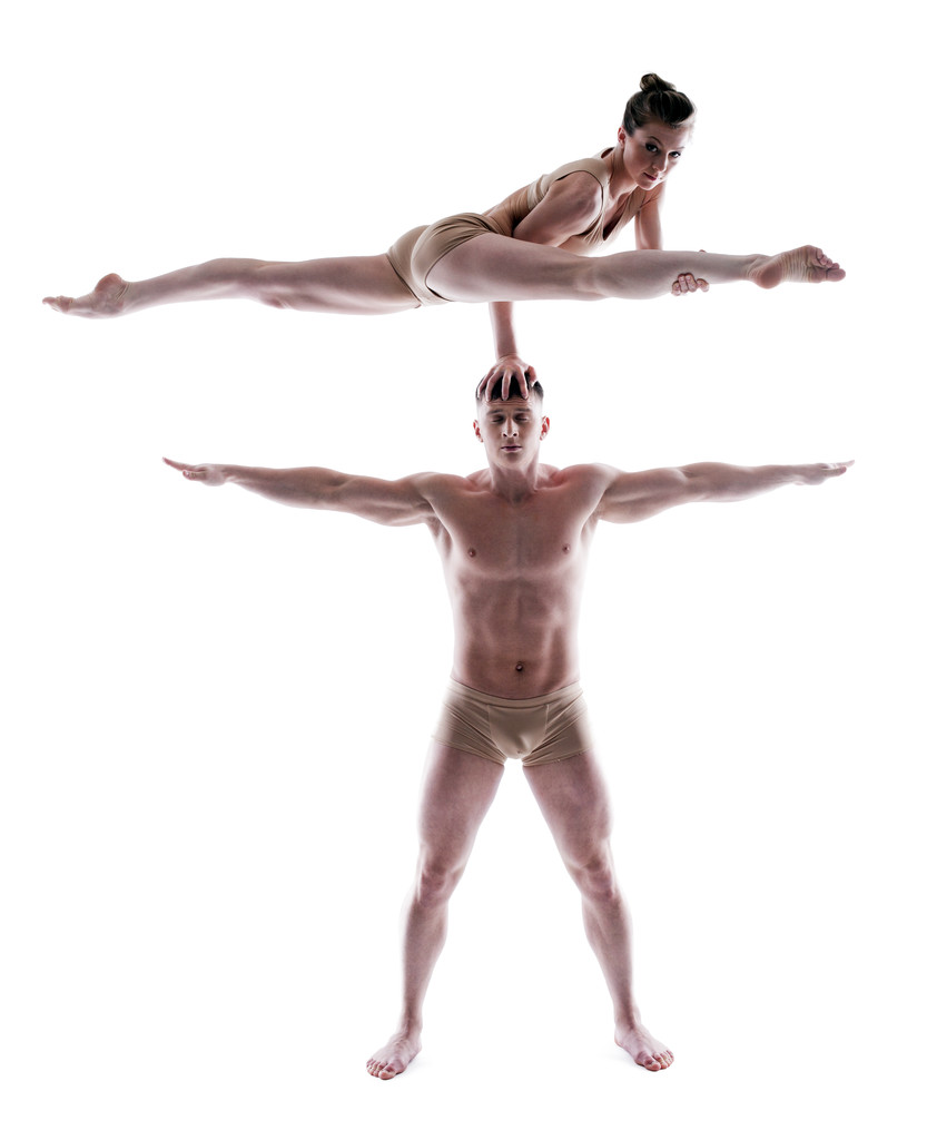 Two flexible gymnasts posing in studio - Photo, Image