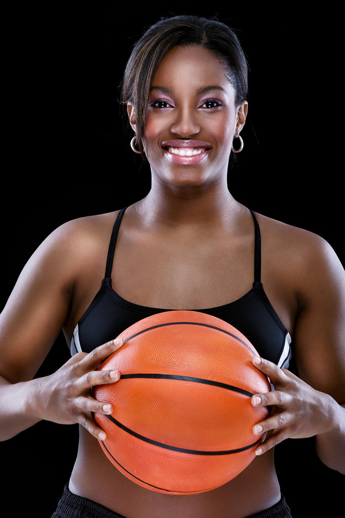 Портрет усміхненої жінки з баскетболом
 - Фото, зображення