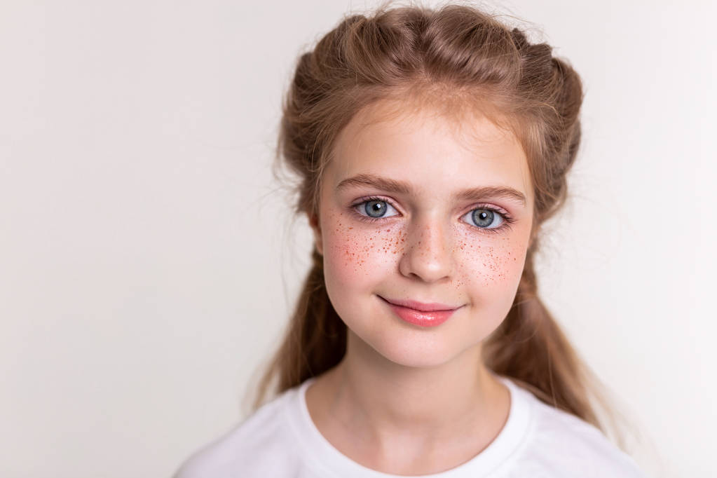 Pretty flawless little child having bright freckles - Photo, Image