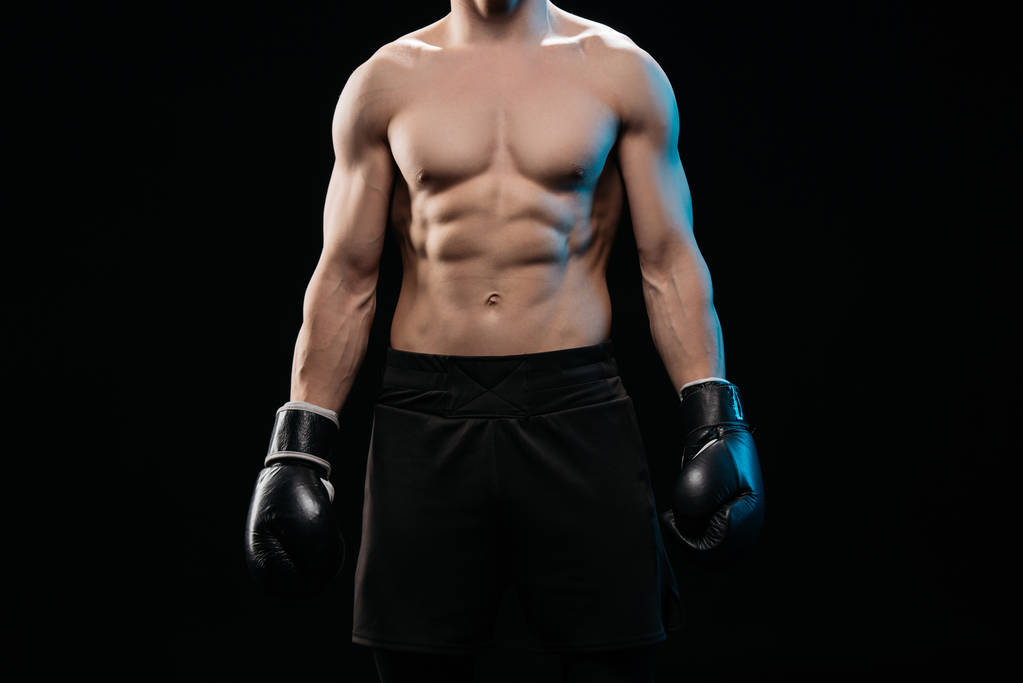 cropped view of muscular shirtless boxer isolated on black - Photo, Image