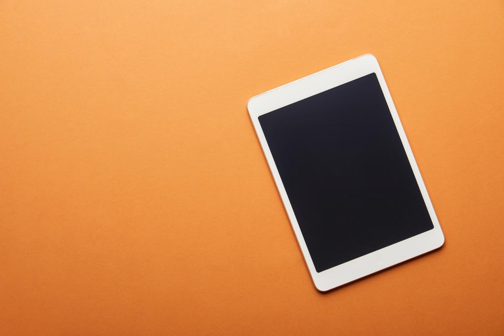 top view of digital tablet with blank screen isolated on orange  - Photo, Image
