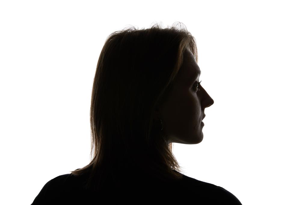 Silhouette of young woman looking away isolated on white - Photo, Image