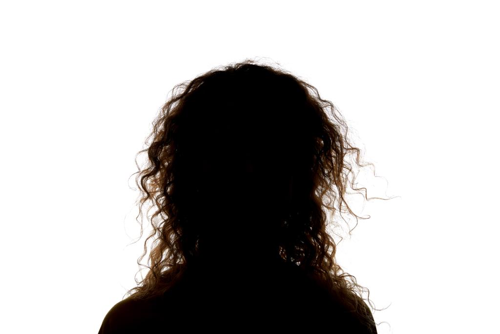Silhouette of woman with curly hair isolated on white - Photo, Image