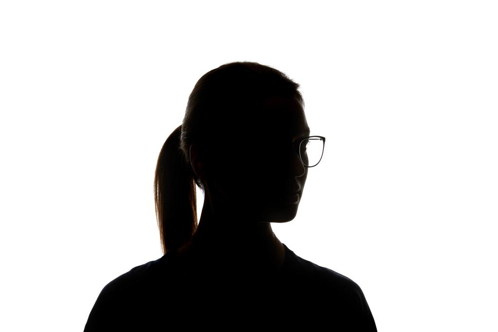 силует жінки в окулярах дивиться ізольовано на білому
 - Фото, зображення