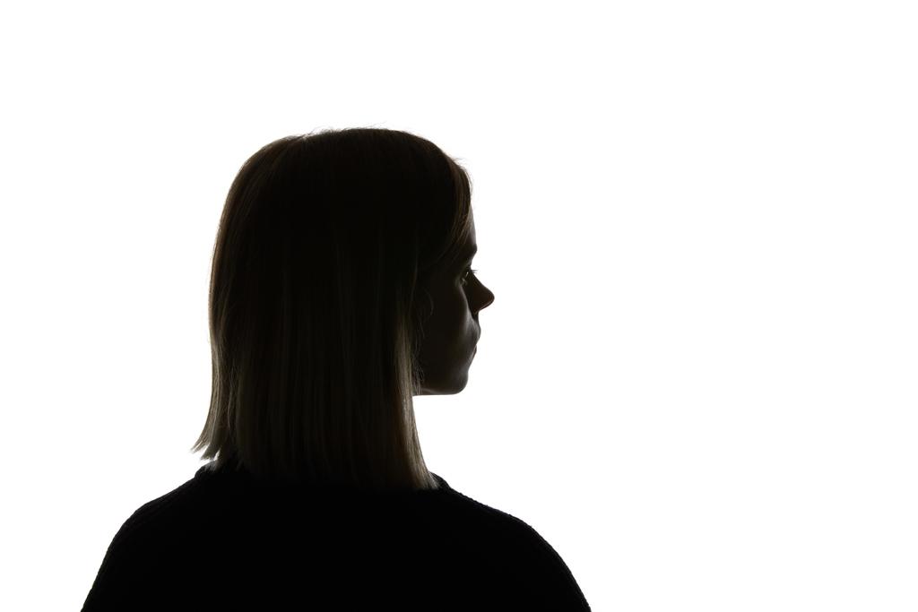 Silhouet van de vrouw weg te kijken geïsoleerd op wit - Foto, afbeelding