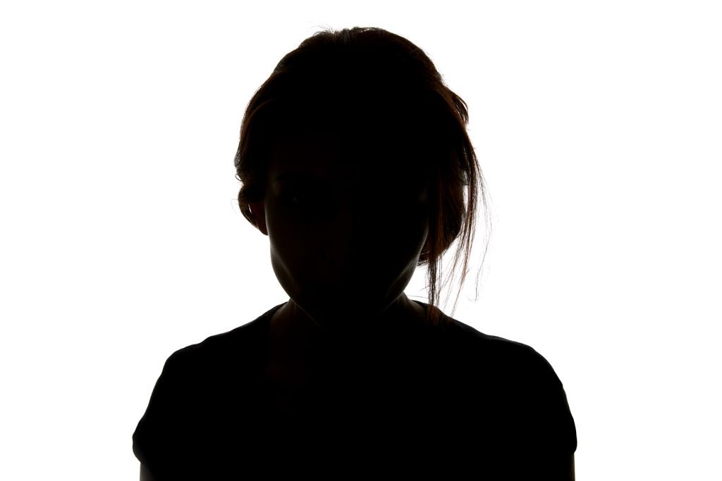 силует жінки, дивлячись на камеру ізольовано на білому
 - Фото, зображення