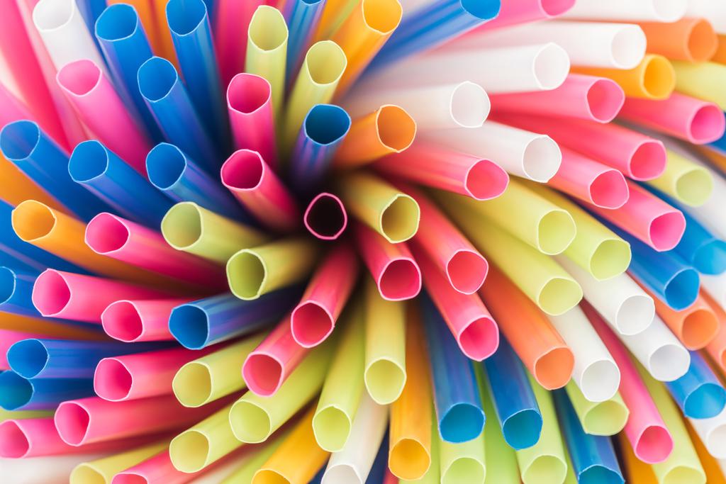 close up of colorful and bright plastic straws with copy space  - Photo, Image