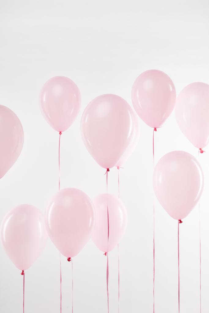 background with festive floating pink air balloons on white - Photo, Image