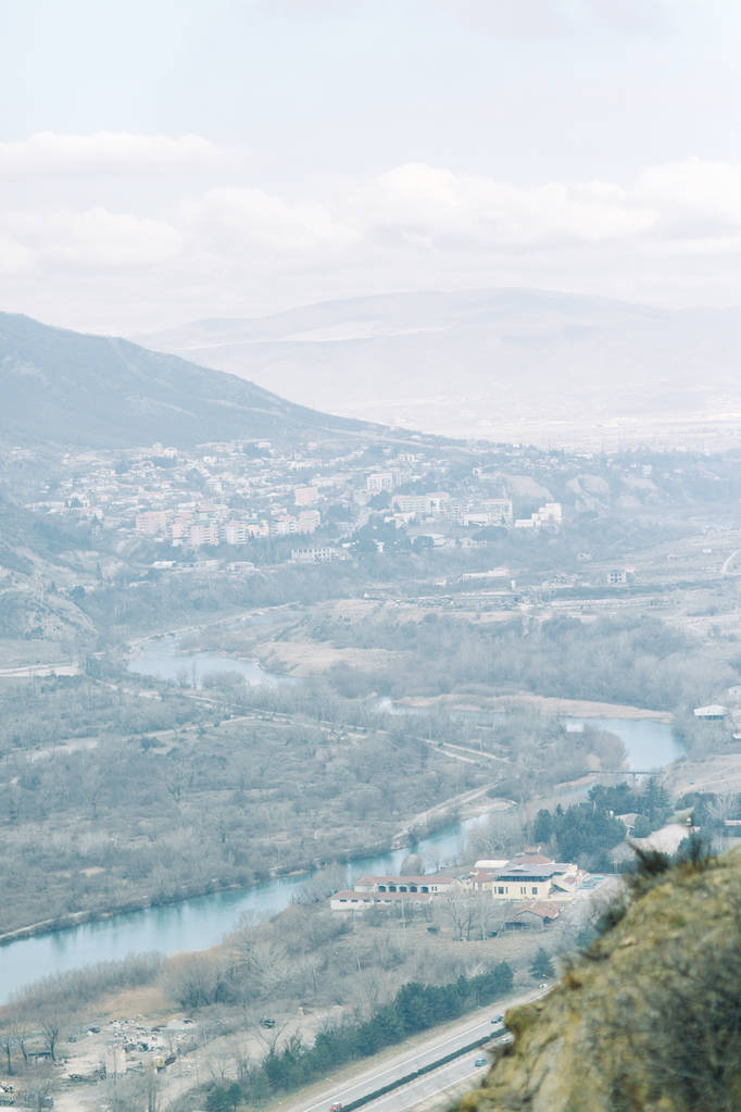 Панорамы самых красивых мест Грузии. Джвари и Гори на рассвете
. - Фото, изображение