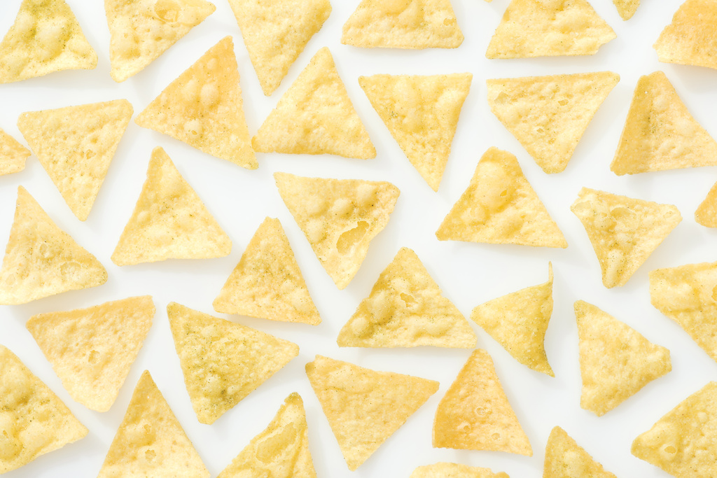 top view of tasty and delicious nachos on white background  - Photo, Image