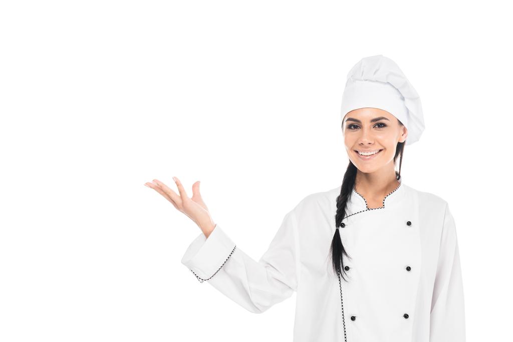 Chef sorrindo alegre no gesto uniforme isolado no branco
 - Foto, Imagem