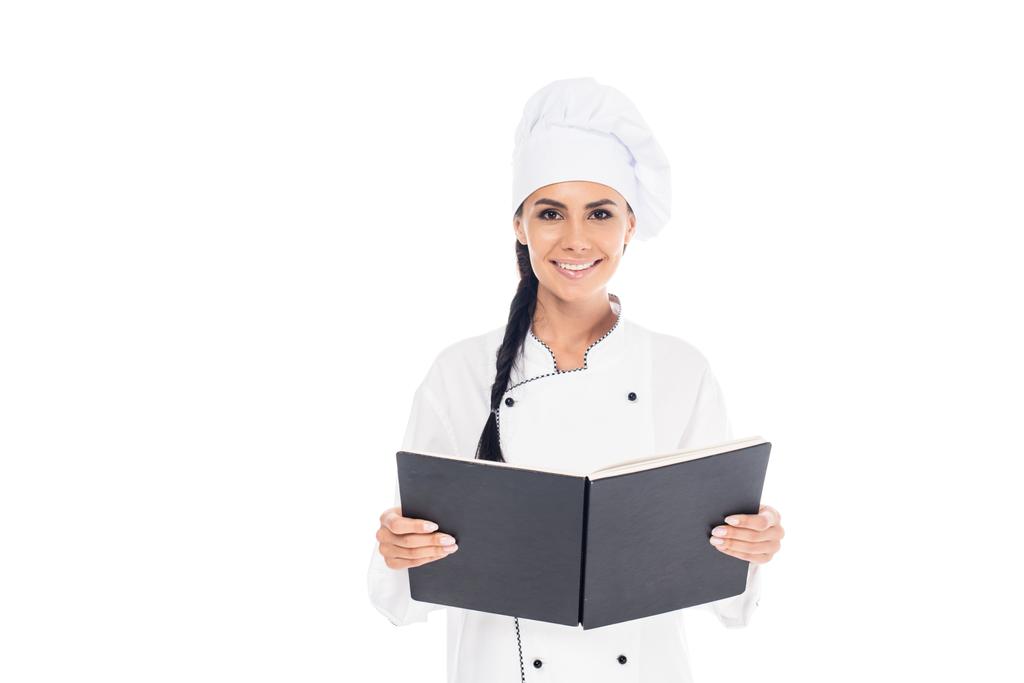 Шеф-кухар у формі, що тримає чорну книгу ізольовано на білому
 - Фото, зображення