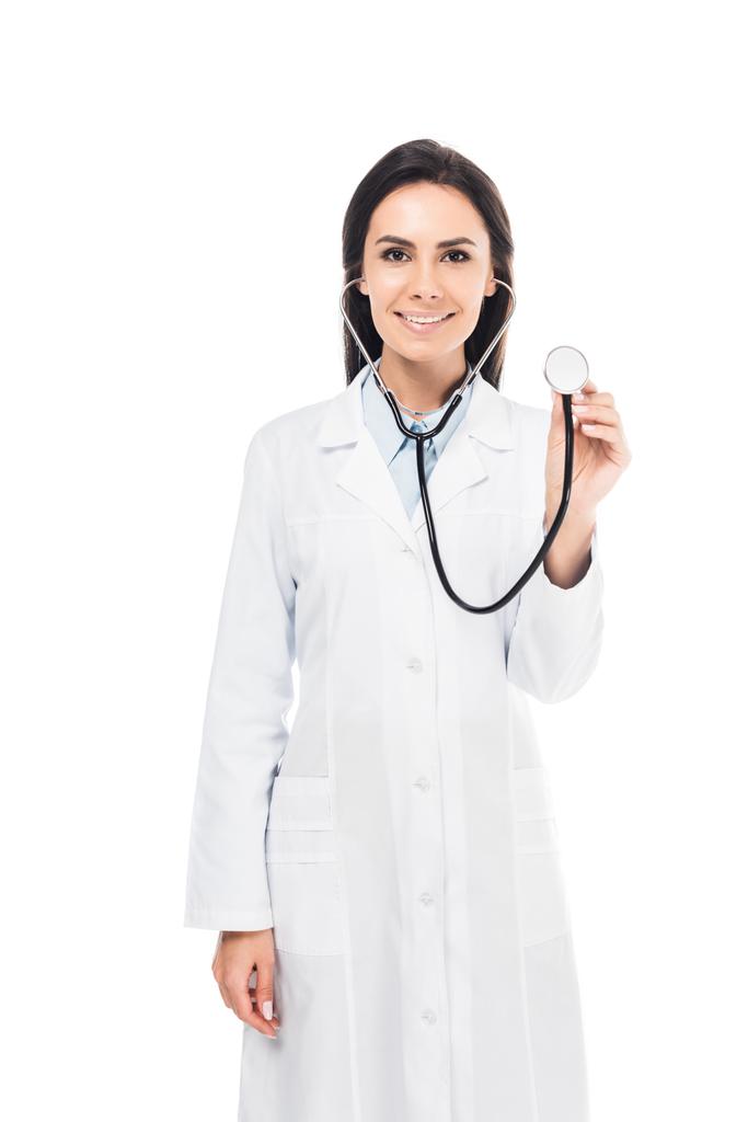 Красивый доктор в белом халате с помощью стетоскопа изолирован на белом
 - Фото, изображение