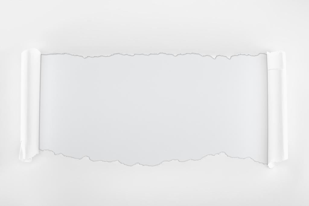 repaleinen kuvioitu paperi, jonka reunat ovat valkoisella pohjalla
  - Valokuva, kuva