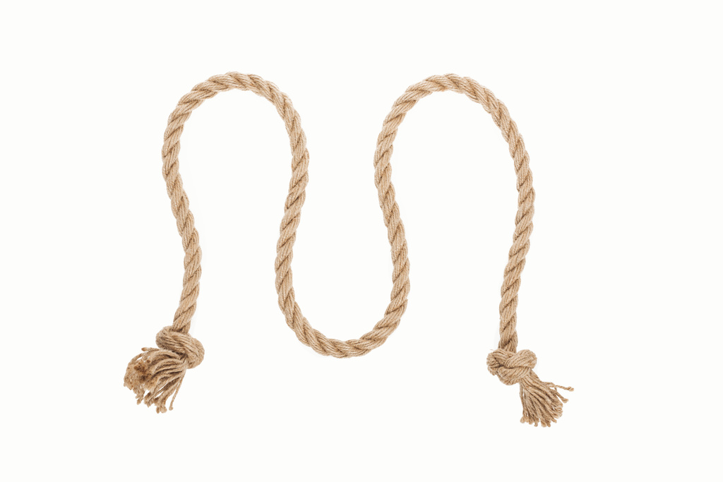 Jute gewellt Seil mit Knoten isoliert auf weiß  - Foto, Bild