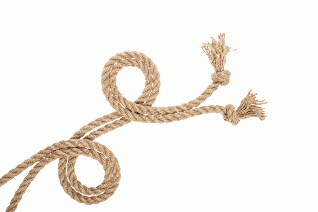 stočené brown a juty lana s uzly izolované na bílém  - Fotografie, Obrázek