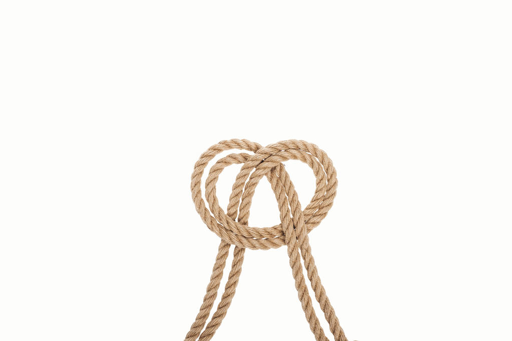 námořní hnědé a kroucená lana s uzlem námořník izolované na bílém  - Fotografie, Obrázek