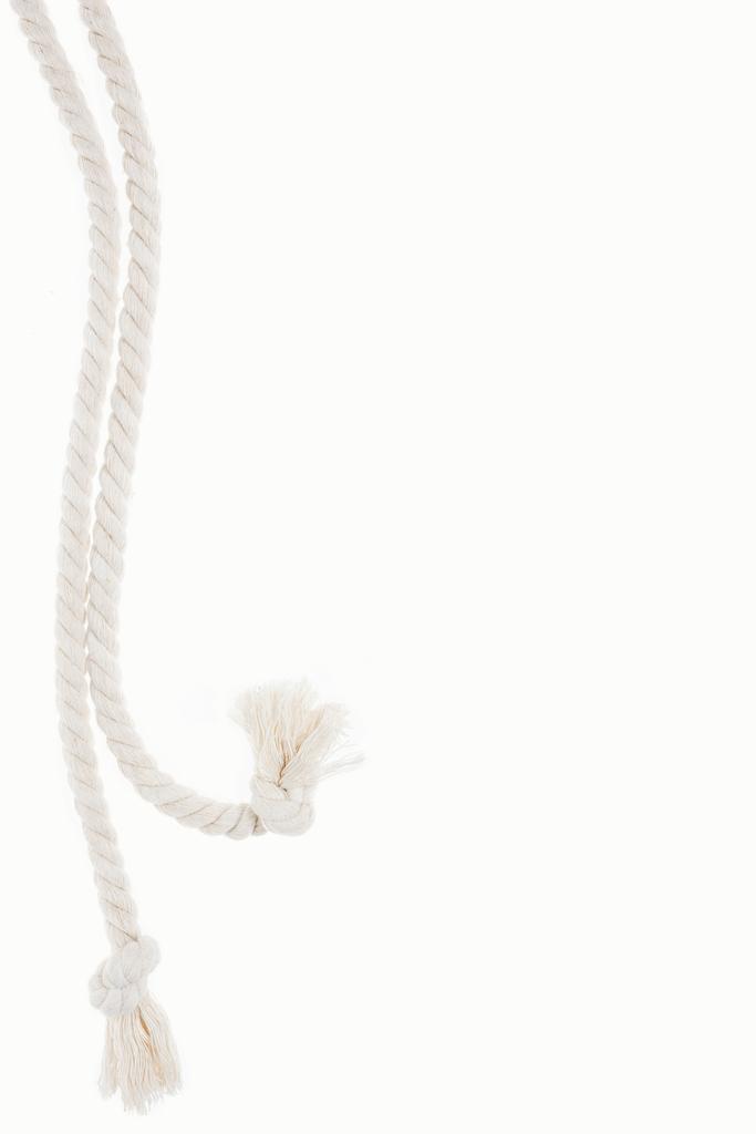 biały długich sznurów z węzłów na białym tle - Zdjęcie, obraz