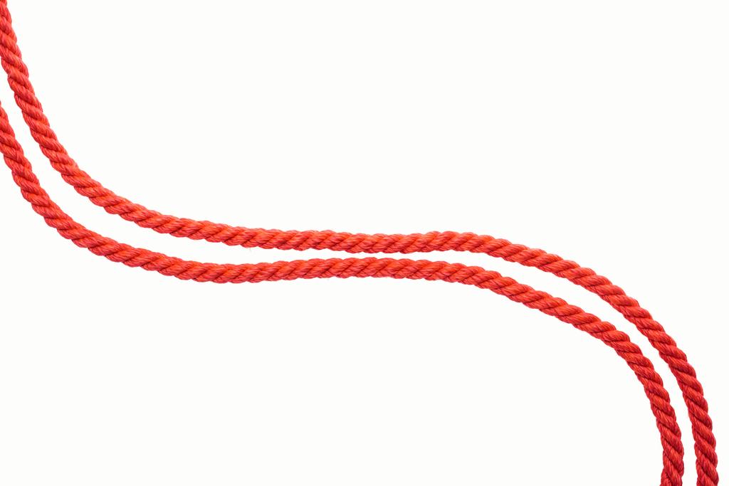 lines of red waved ropes isolated on white - Photo, Image
