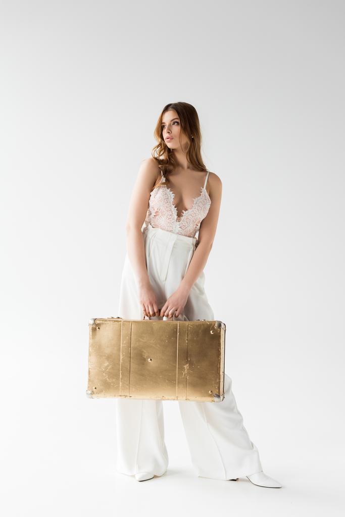 bavul duran beyaz holding şık güzel kız  - Fotoğraf, Görsel