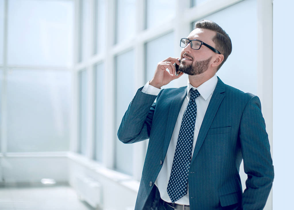 successful businessman talking on mobile phone. - Photo, Image