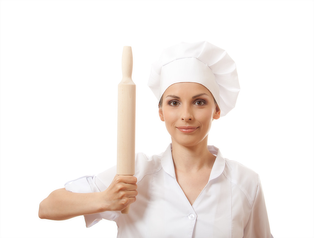 Baker / Chef femme tenant rouleau à pâtisserie
 - Photo, image