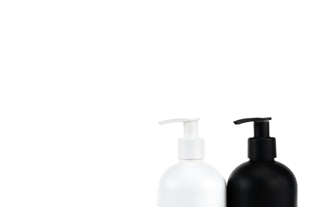 Black and white cosmetic spray bottles isolated on white - Photo, Image