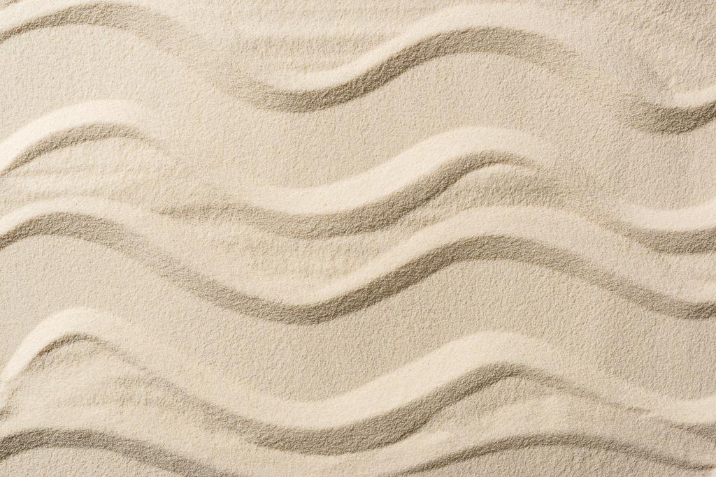 vista superior de fundo texturizado com areia e linhas lisas
 - Foto, Imagem
