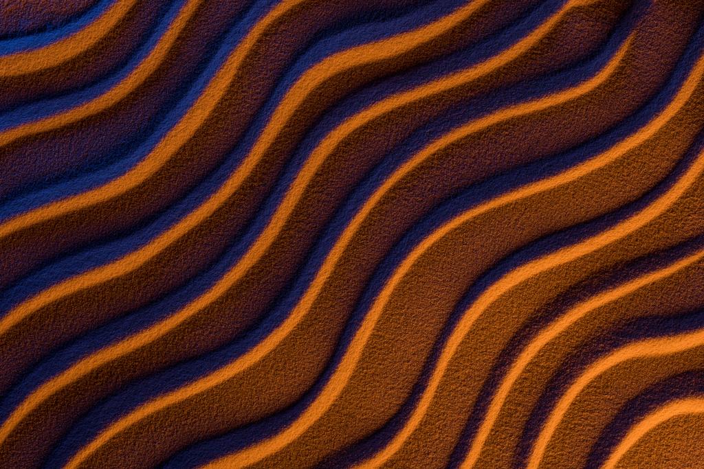 az absztrakt hullámos háttér felülnézete homokkal és színszűrővel - Fotó, kép