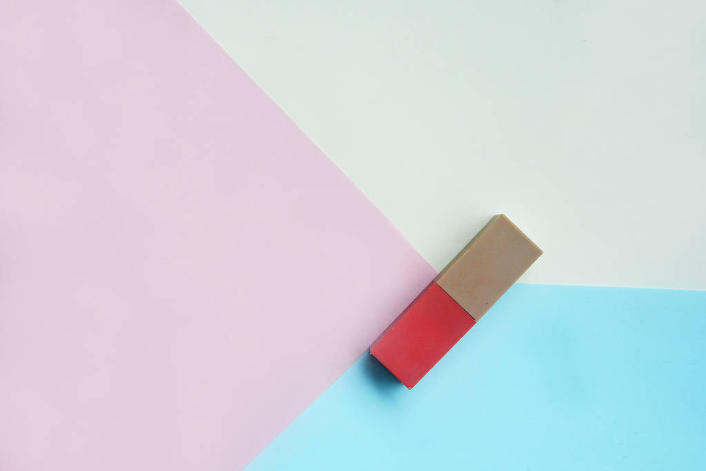 Red lipstick isolated on pastel background, Minimal makeup fashi - Photo, Image