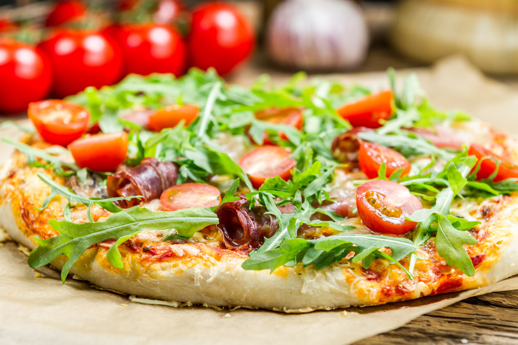 Closeup of pizza with parma ham - Photo, Image