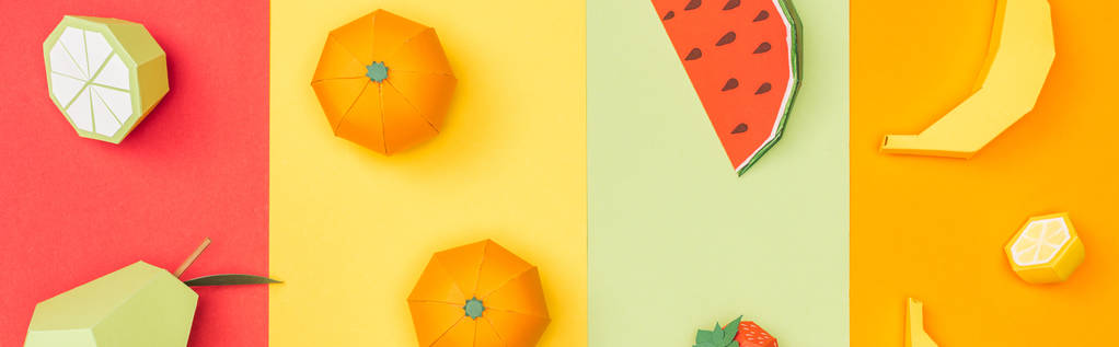 panoramic shot of various origami fruits on colorful paper stripes - Photo, Image