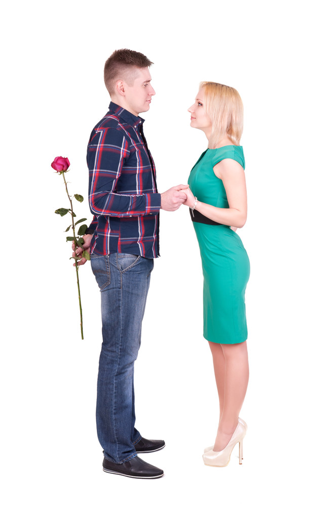 hombre con rosa haciendo sorpresa para su mujer
 - Foto, imagen