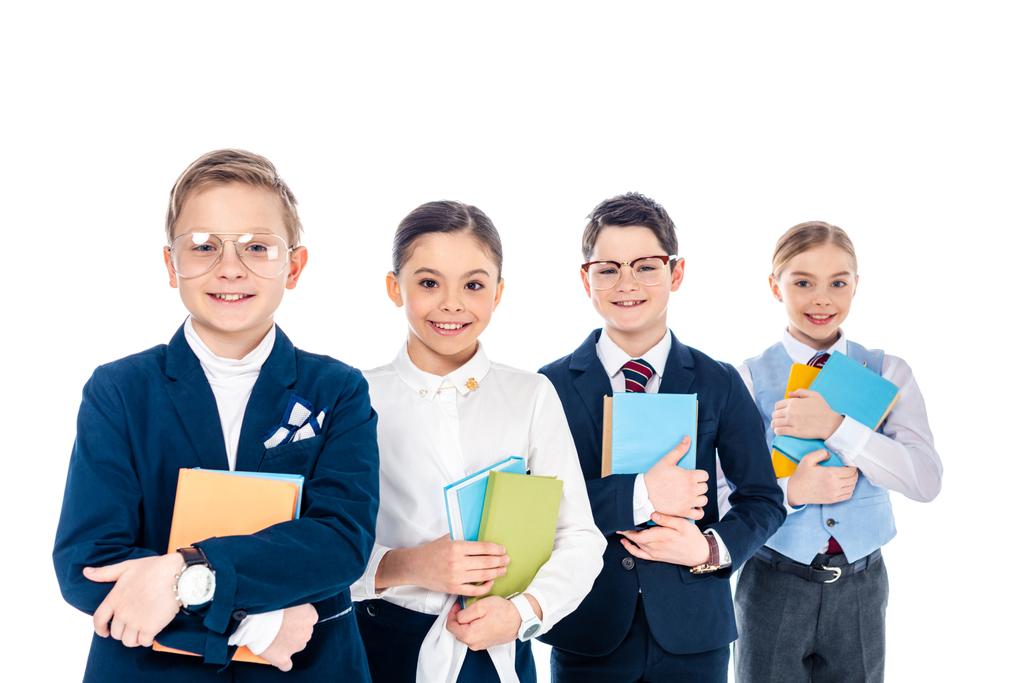 scolari felici che fingono di essere uomini d'affari con libri isolati su bianco
 - Foto, immagini