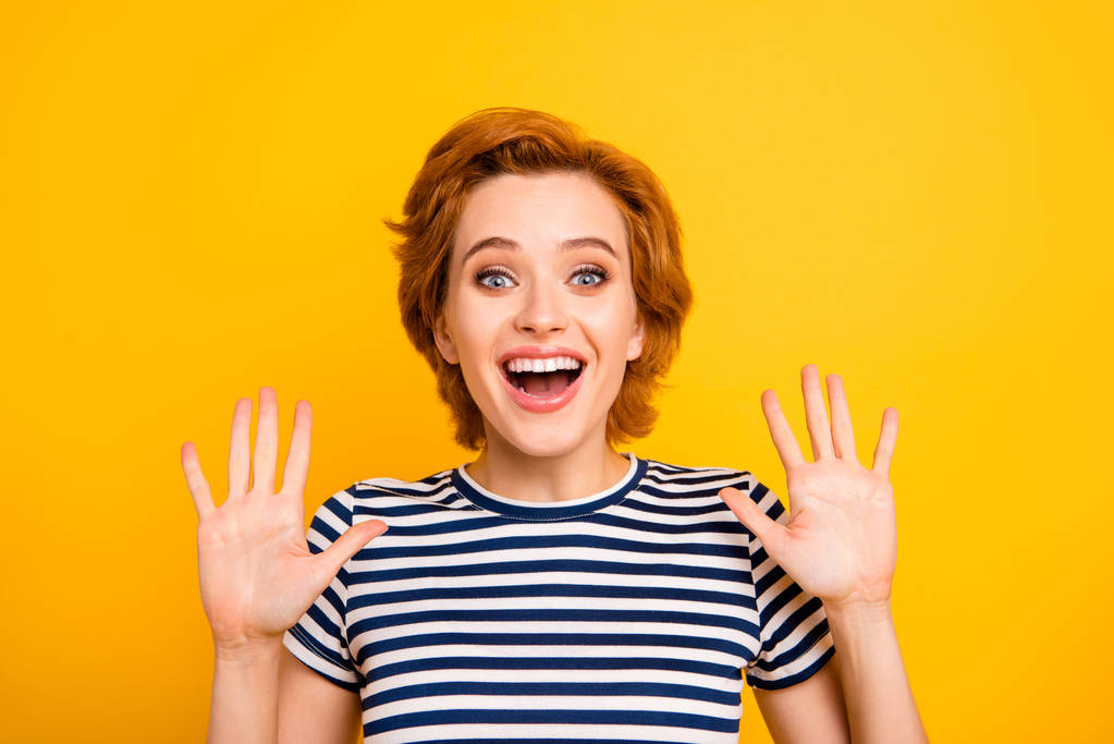 Close up photo beautiful amazing she her her lady hands arms raised high-five sign symbol bye hi hey say wearing casual striped white blue t-shirt outfit clothes isolated yellow bright background
 - Foto, Imagen