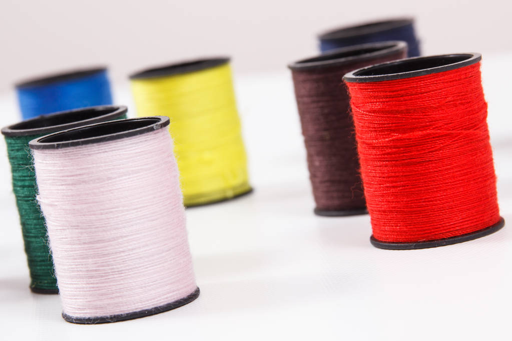 Spools of colorful thread as accessories for using in sewing. - Photo, Image