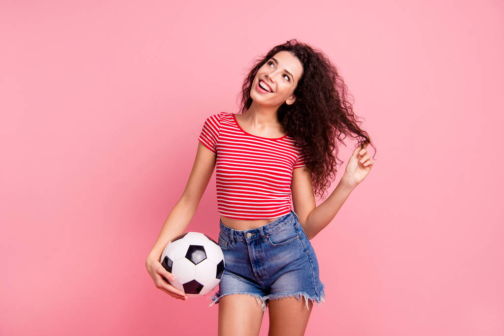 Portrait of her she nice-looking attractive lovely shine charming cheerful cheery wavy-haired girl holding in hand ball playing with curls isolated over pink pastel background - Photo, Image