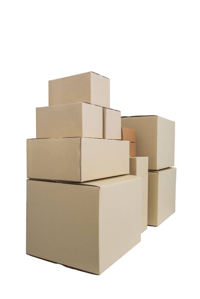 Cajas de cartón en diferentes tamaños cajas apiladas aisladas en whi
 - Foto, imagen