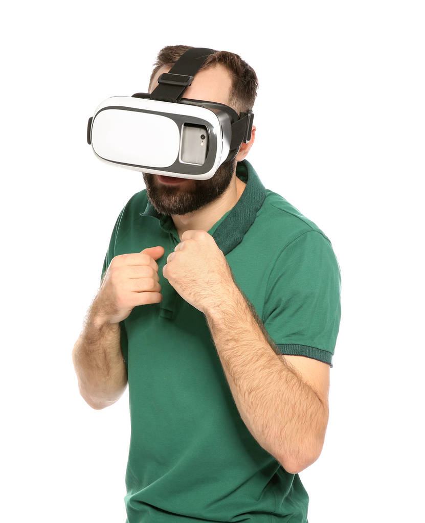 Érzelmi fiatalember játszik videojátékokkal a virtuális valóság headset elszigetelt fehér - Fotó, kép