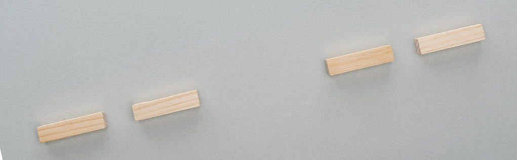 panoramic shot of wooden blocks isolated on grey - Photo, Image