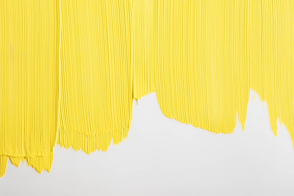 bílé pozadí malované žlutě s kopírovacím prostorem - Fotografie, Obrázek