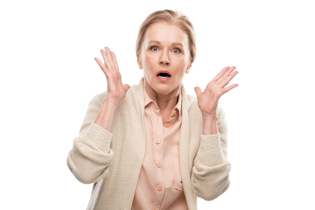 здивована жінка середнього віку жестикуляція ізольовані на білому
 - Фото, зображення