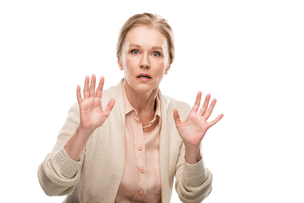 scioccato donna di mezza età gesticolando con le mani isolato su bianco
 - Foto, immagini