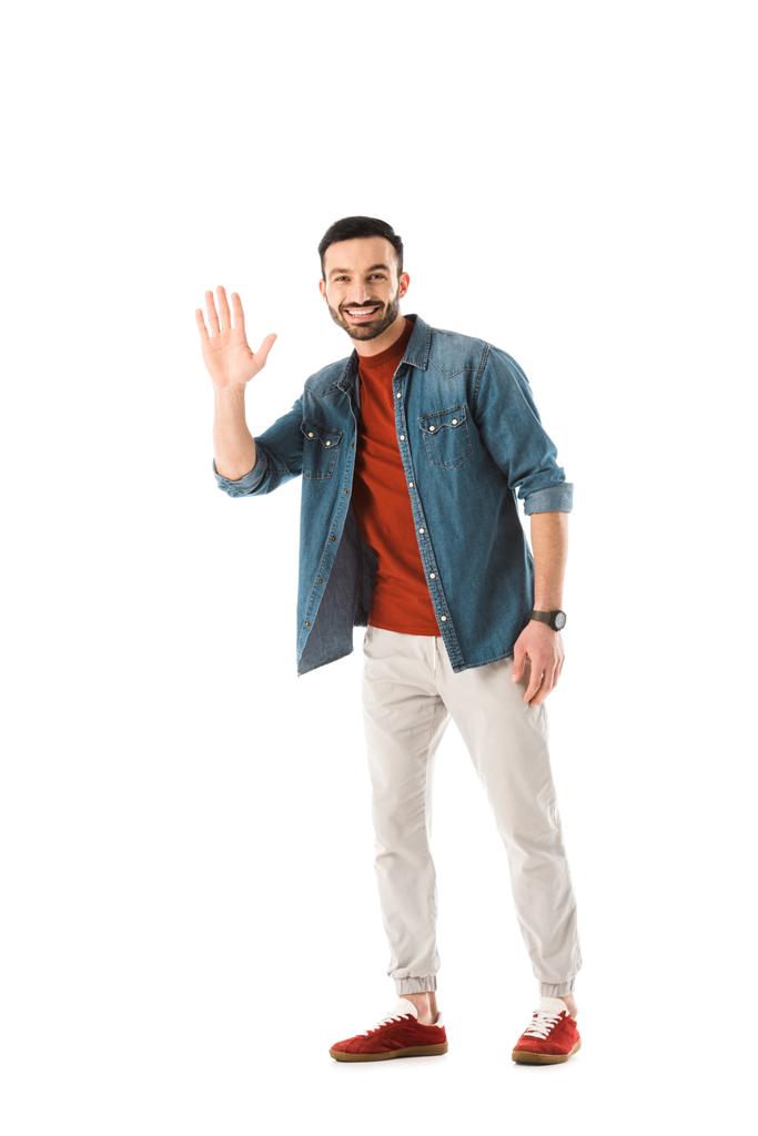 homem barbudo positivo olhando para a câmera e mostrando Olá gesto isolado no branco
 - Foto, Imagem