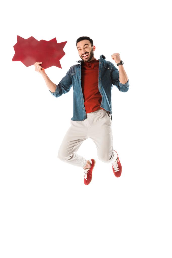 glücklich schöner Mann mit Gedankenblase springen und zeigen ja Geste isoliert auf weiß - Foto, Bild