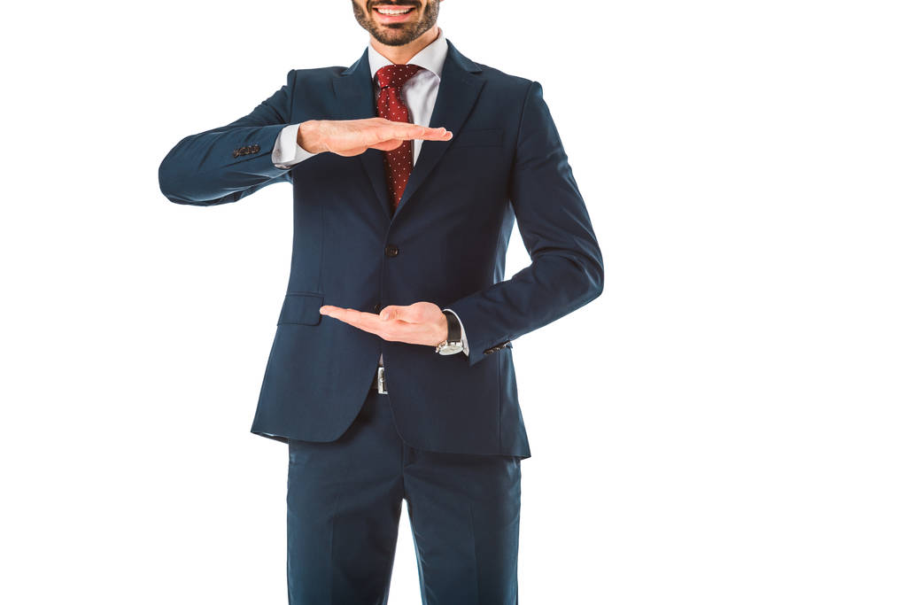 частковий вид бізнесмена в чорному костюмі жестинг ізольовані на білому
 - Фото, зображення