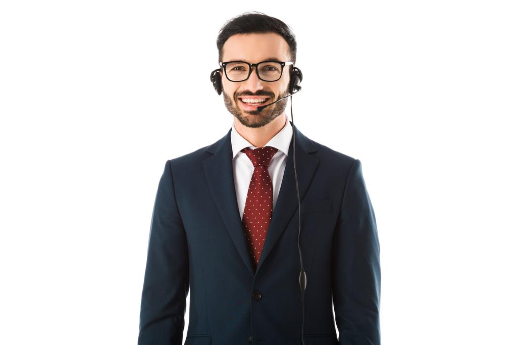 cheerful call center operator in headset smiling while looking at camera isolated on white - Photo, Image
