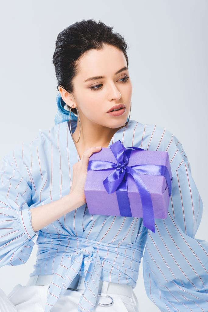 beautiful stylish with girl gift box posing on grey - Photo, Image