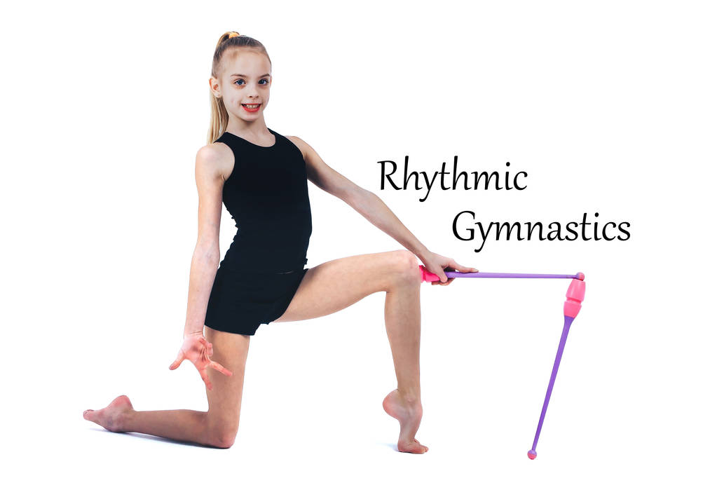 Teenager girl gymnast holds in hands clubs for rhythmic gymnastics - Photo, Image